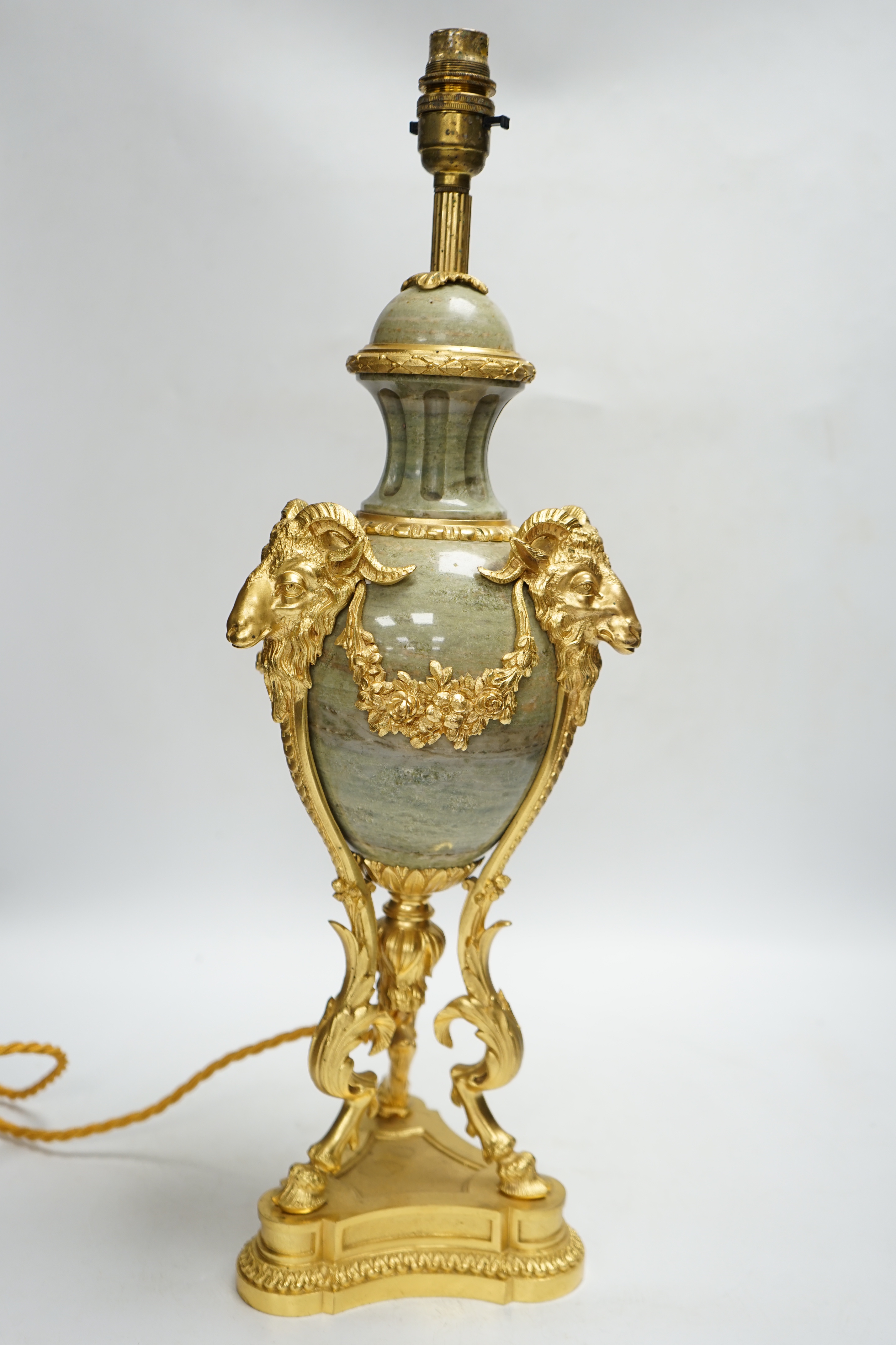 A Louis XVI style ormolu mounted ram’s head table lamp, 52cm.